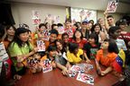 Milka Visits with Children in Malaysia